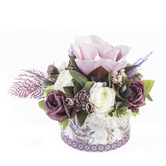 Aranjament floral, cutie rotunda cu flloare magnolie
